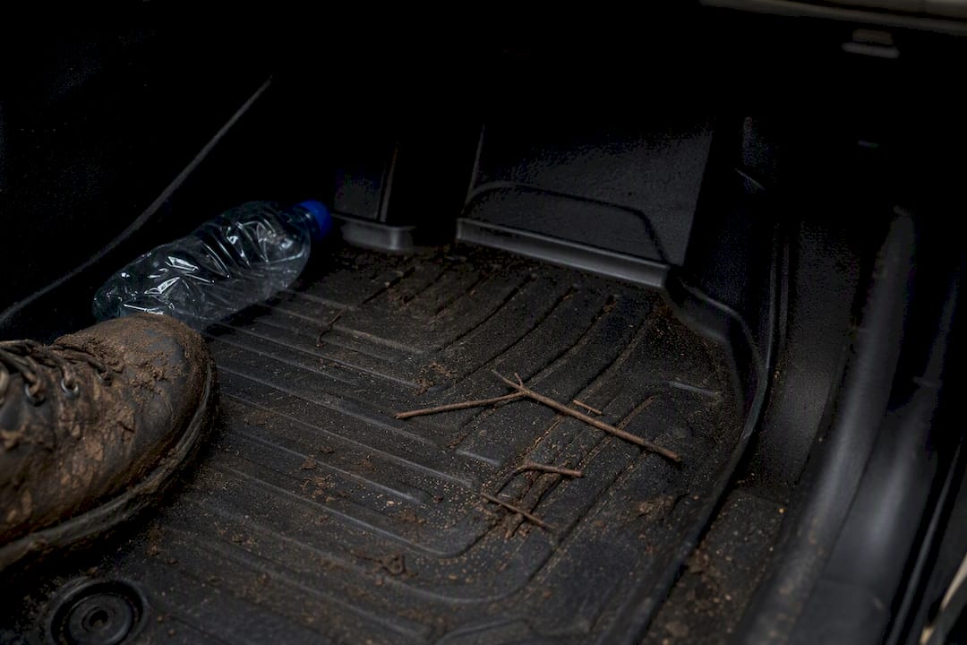 Custom all-weather floor liner fitted in vehicle footwell