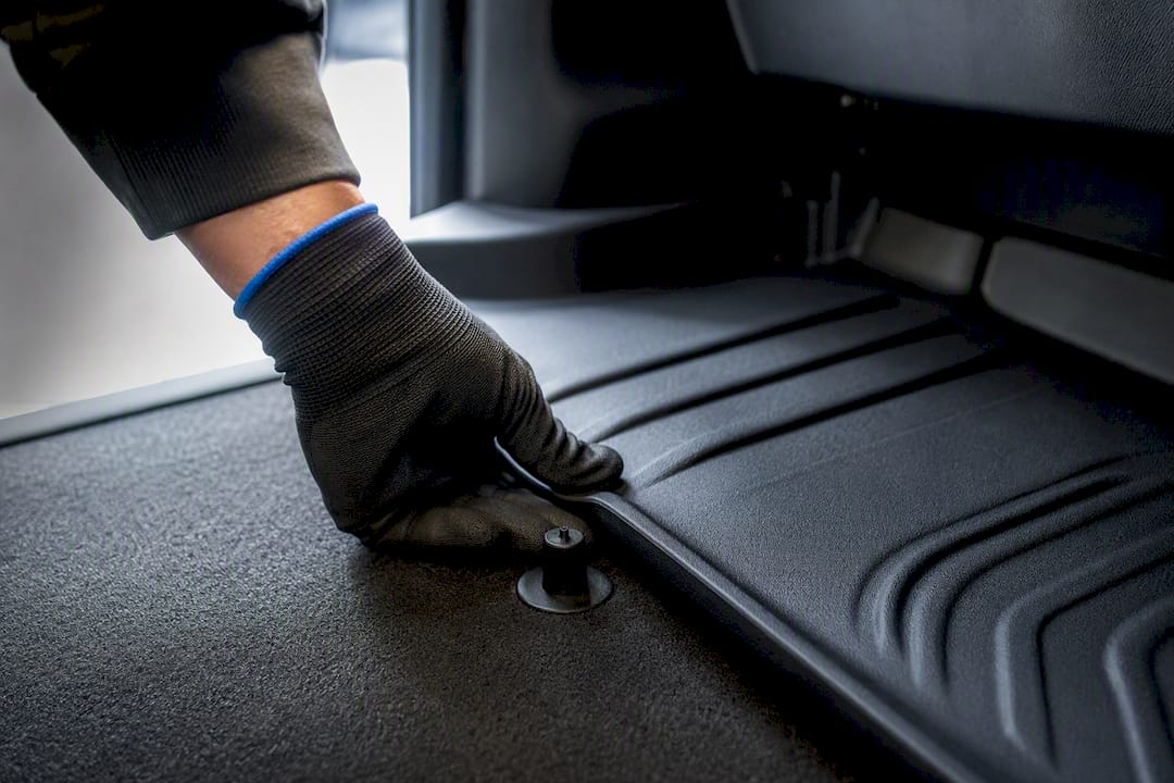 Checking floor liner fitment around retention post