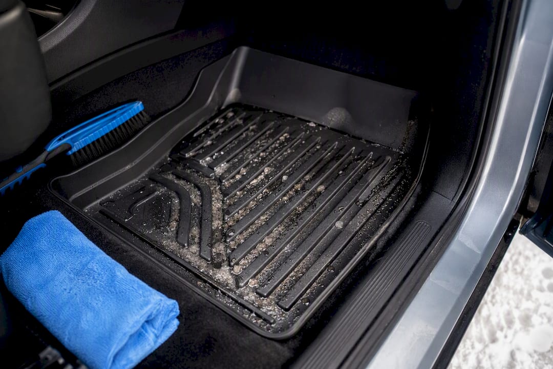 Winter slush contained inside raised floor liner
