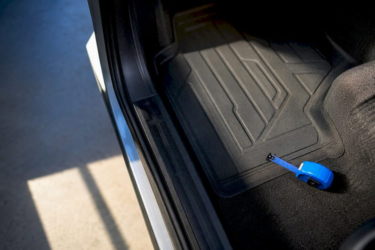Precisely fitted liner inside truck footwell