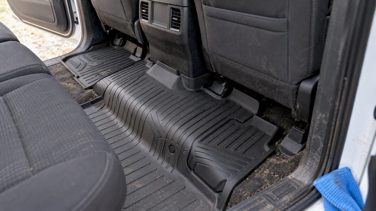 SmartCoverage liner covering vehicle transmission hump