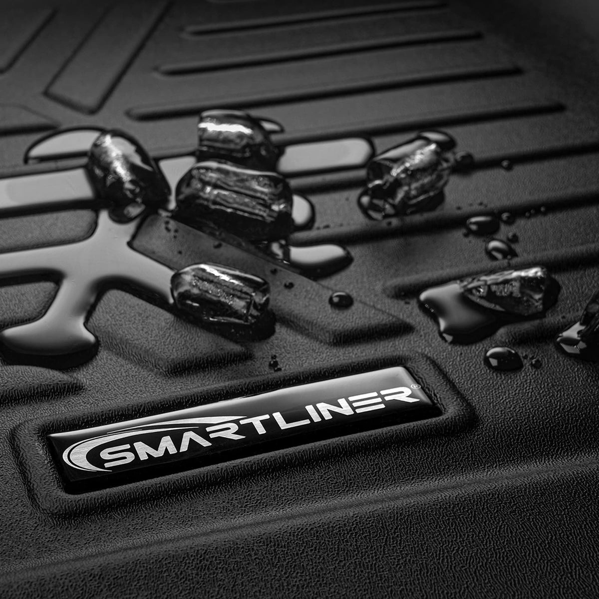 Load video: Video showcasing SMARTLINER custom-fit floor liners: precision fit, raised-edge coverage, and easy-clean TPE material.