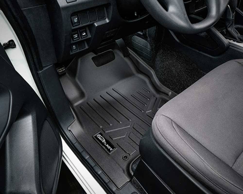 SMARTLINER custom fit floor mat in a 2025 Nissan Frontier, front driver-side footwell, black all-weather mat with raised edges